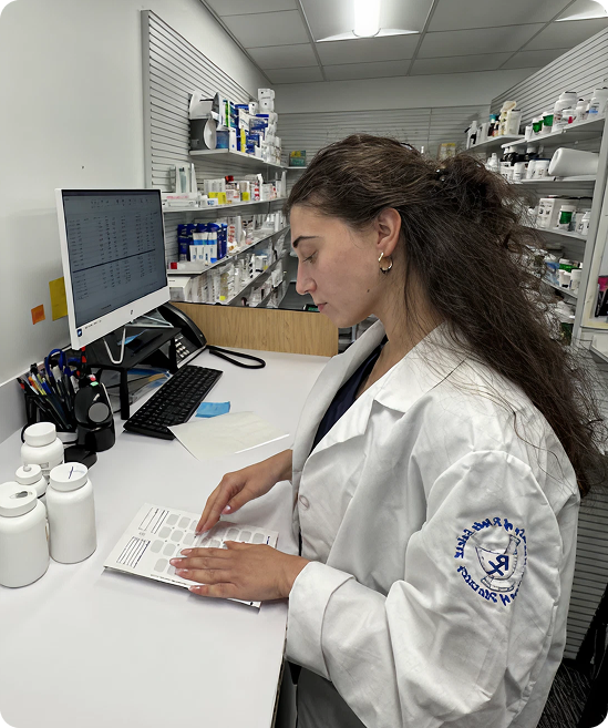 Pharmacist Reading Receipt